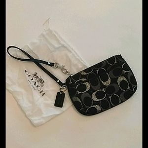 Coach wristlet black with silver C logo